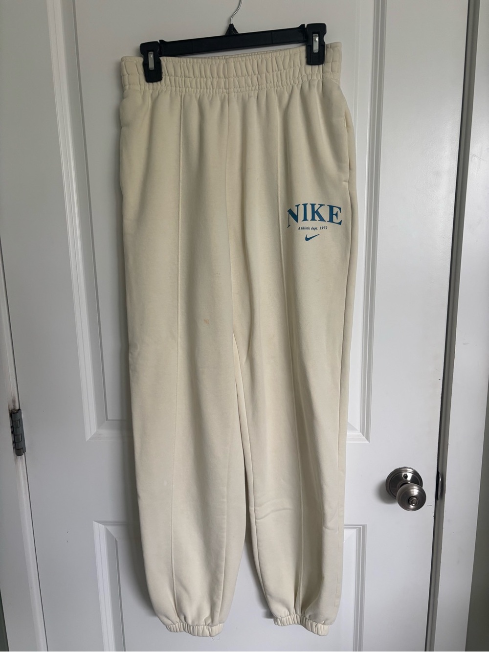 Nike Women’s Light Yellow Sweatpants with Blue Logo Accent